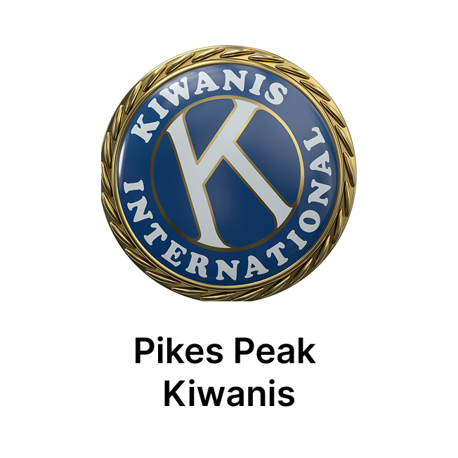 A circular Kiwanis International logo with a large "K" in the center, surrounded by a gold rope border. Below the logo, black text reads, "Pikes Peak Kiwanis.
